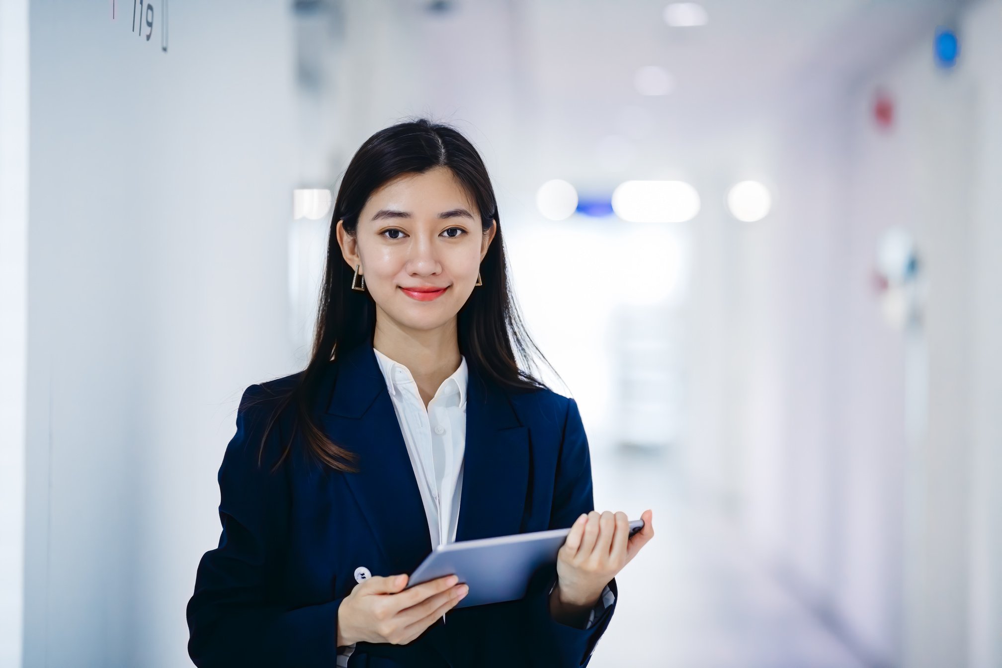 Professional Asian businesswoman working in office.